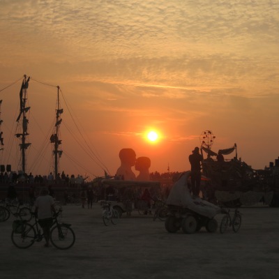 Sunrise over the beautiful Embrace sculpture... just hours before it burned